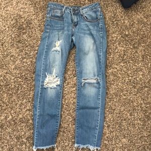 A small ripped jeans